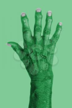 Hand of an old woman with arthritis, isolated on white, Libya