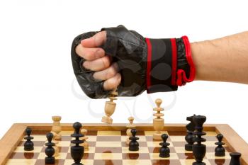 Playing chess in freefight gloves, isolated on white