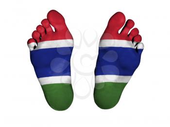 Feet with flag, sleeping or death concept, flag of The Gambia
