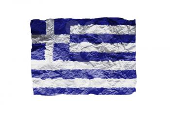 Close up of a curled paper on white background, print of the flag of Greece