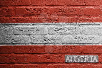 Brick wall with a painting of a flag isolated, Austria