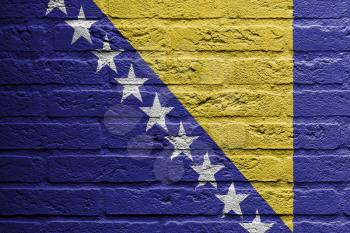 Brick wall with a painting of a flag isolated, Bosnia and Herzegovina