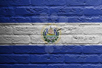 Brick wall with a painting of a flag isolated, El Salvador