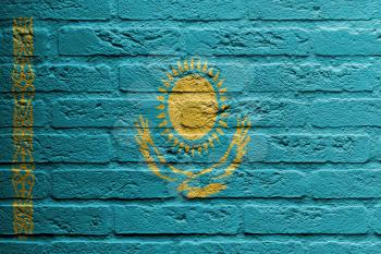 Brick wall with a painting of a flag isolated, Kazakhstan