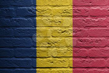 Brick wall with a painting of a flag isolated, Romania
