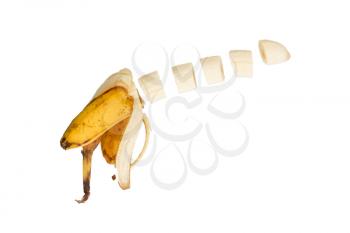 Ripe banana isolated on white, floating pieces