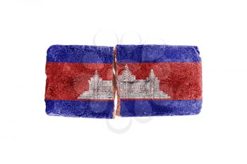 Rough broken brick, isolated on white background, flag of Cambodia