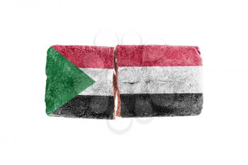 Rough broken brick, isolated on white background, flag of Sudan