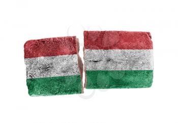 Rough broken brick, isolated on white background, flag of Hungary