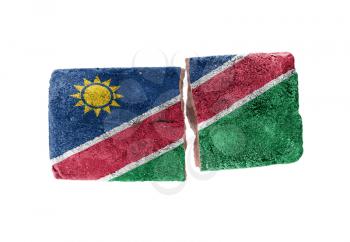 Rough broken brick, isolated on white background, flag of Namibia