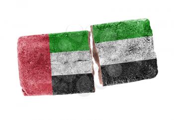 Rough broken brick, isolated on white background, flag of the UAE