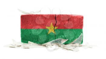 Brick with broken glass, violence concept, flag of Burkina Faso