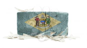 Brick with broken glass, violence concept, flag of Delaware