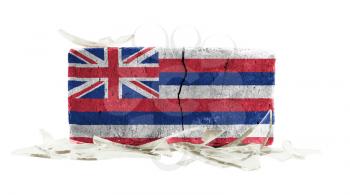Brick with broken glass, violence concept, flag of Hawaii