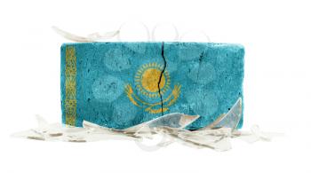 Brick with broken glass, violence concept, flag of Kazakhstan