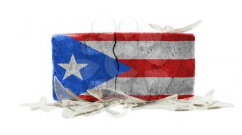 Brick with broken glass, violence concept, flag of Puerto Rico