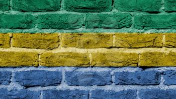 Very old brick wall texture, flag of Gabon