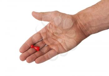 Hand holding a red pawn, isolated on white