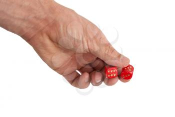 Hand holding red dices, isolated on white