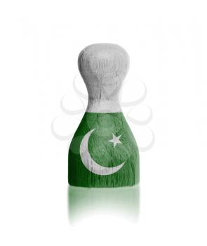 Wooden pawn with a painting of a flag, Pakistan