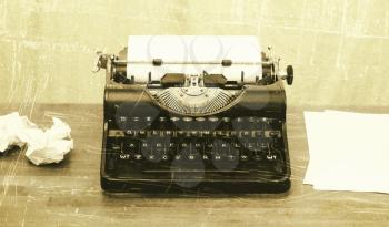 Close-up of an old typewriter with paper, vintage look