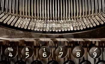 Detail of an old typewriter, warm filter