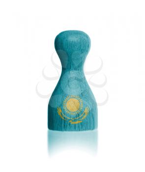 Wooden pawn with a painting of a flag, Kazakhstan