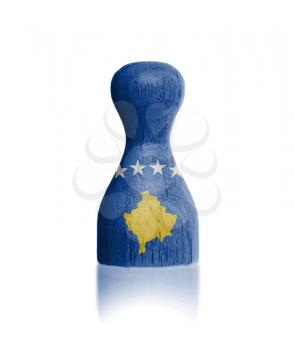 Wooden pawn with a painting of a flag, Kosovo