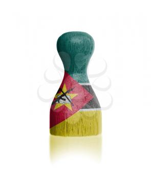 Wooden pawn with a painting of a flag, Mozambique