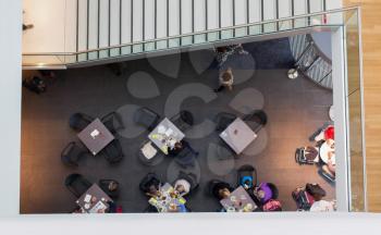Top view of a restaurant, people lunching