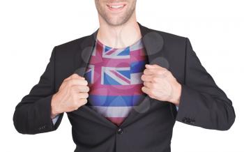 Businessman opening suit to reveal shirt with state flag (USA), Hawaii