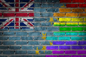 Dark brick wall texture - coutry flag and rainbow flag painted on wall - Tuvalu