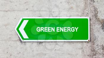 Green sign on a concrete wall - Green energy