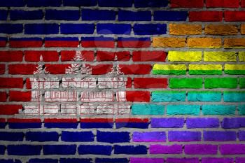 Dark brick wall texture - coutry flag and rainbow flag painted on wall - Cambodia