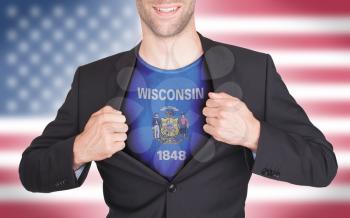 Businessman opening suit to reveal shirt with state flag (USA), Wisconsin