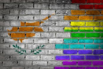 Dark brick wall texture - coutry flag and rainbow flag painted on wall - Cyprus