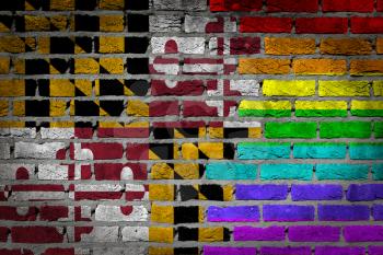 Dark brick wall texture - coutry flag and rainbow flag painted on wall - Maryland