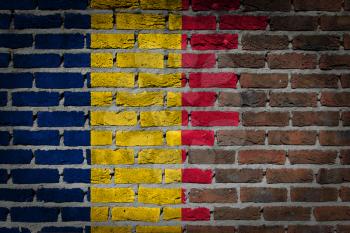 Very old dark red brick wall texture with flag - Romania