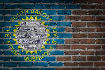 Dark brick wall texture - flag painted on wall - South Dakota
