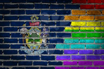 Dark brick wall texture - coutry flag and rainbow flag painted on wall - Maine