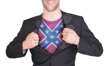 Businessman opening suit to reveal shirt with flag, confederacy