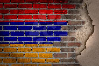 Dark brick wall texture with plaster - flag painted on wall - Armenia