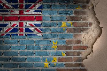 Dark brick wall texture with plaster - flag painted on wall - Tuvalu