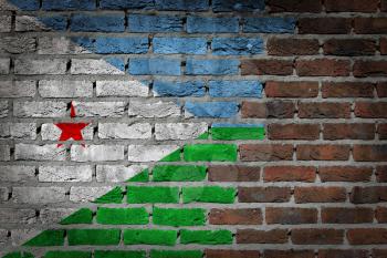 Very old dark red brick wall texture with flag - Djibouti