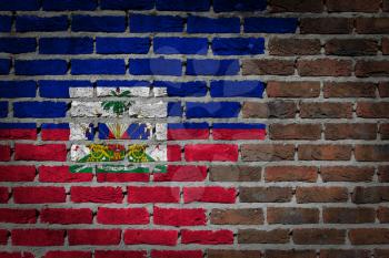 Very old dark red brick wall texture with flag - Haiti