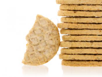 Stack of small cookies isolated on a white background