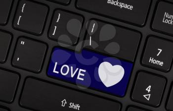 Blue love and heart button on the keyboard, valentine concept