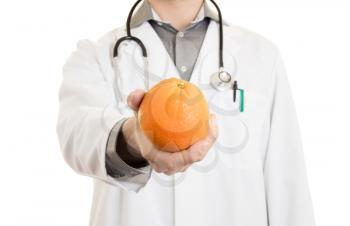 Nutritionist doctor, giving an orange, isolated on white