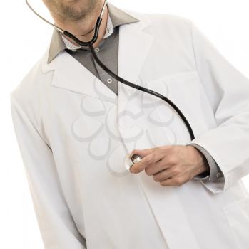 Close up of a Doctor's hand, holding a stethoscope, isolated on white