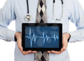 Doctor, isolated on white backgroun,  holding digital tablet - Heartbeat graph